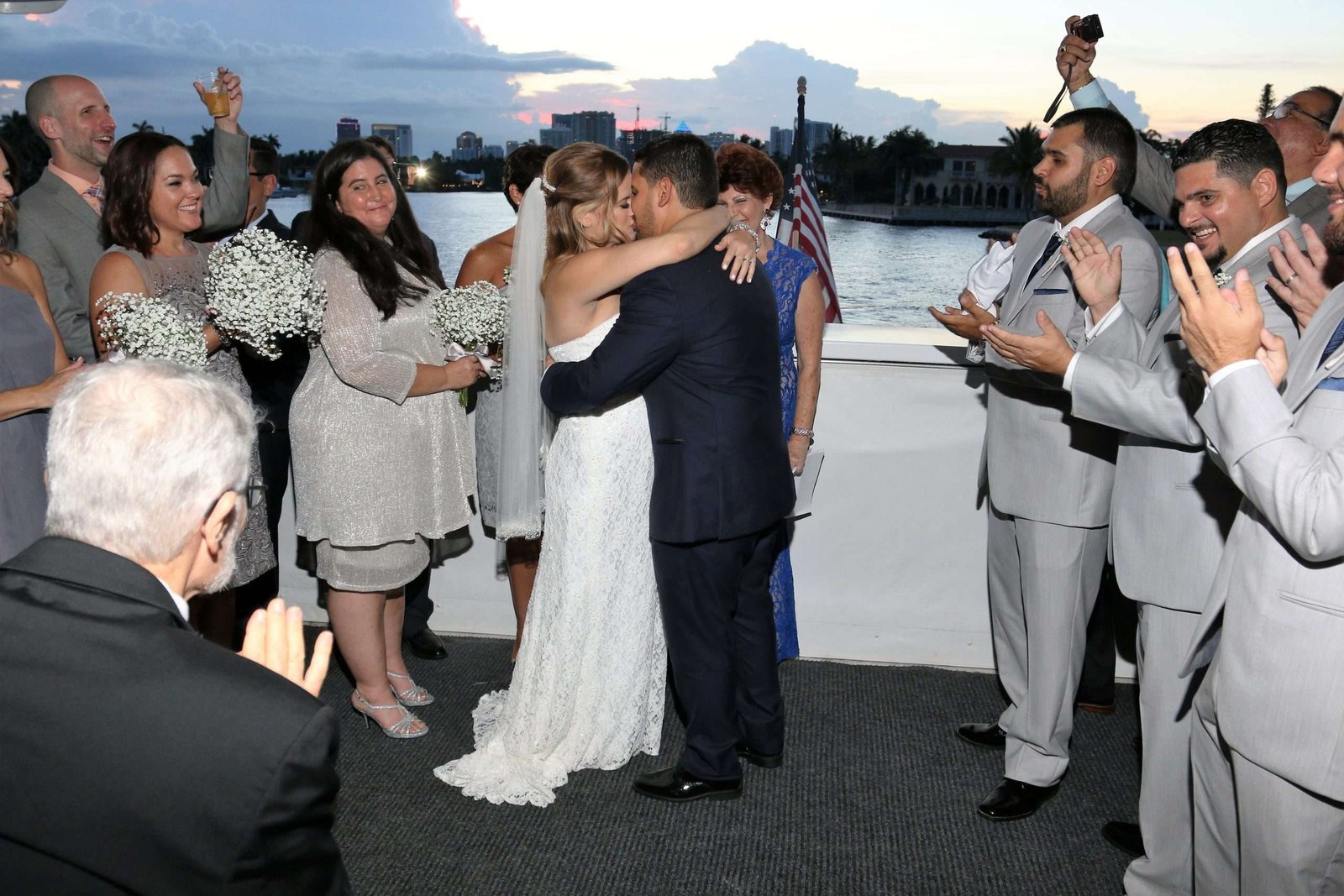 couple celebrating affordable yacht wedding in South Florida {{brizy_dc_image_alt imageSrc=